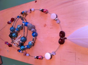 créations colliers et bracelets plume